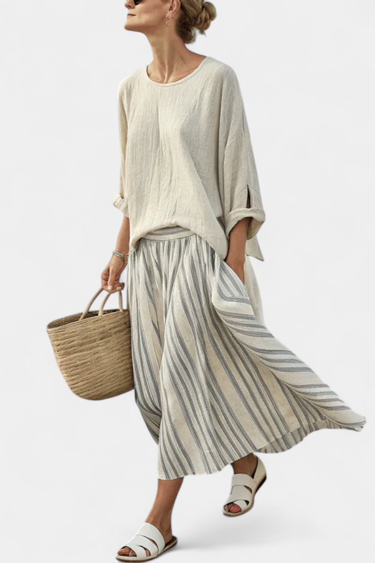 Aurora – comfortable blouse and striped midi skirt