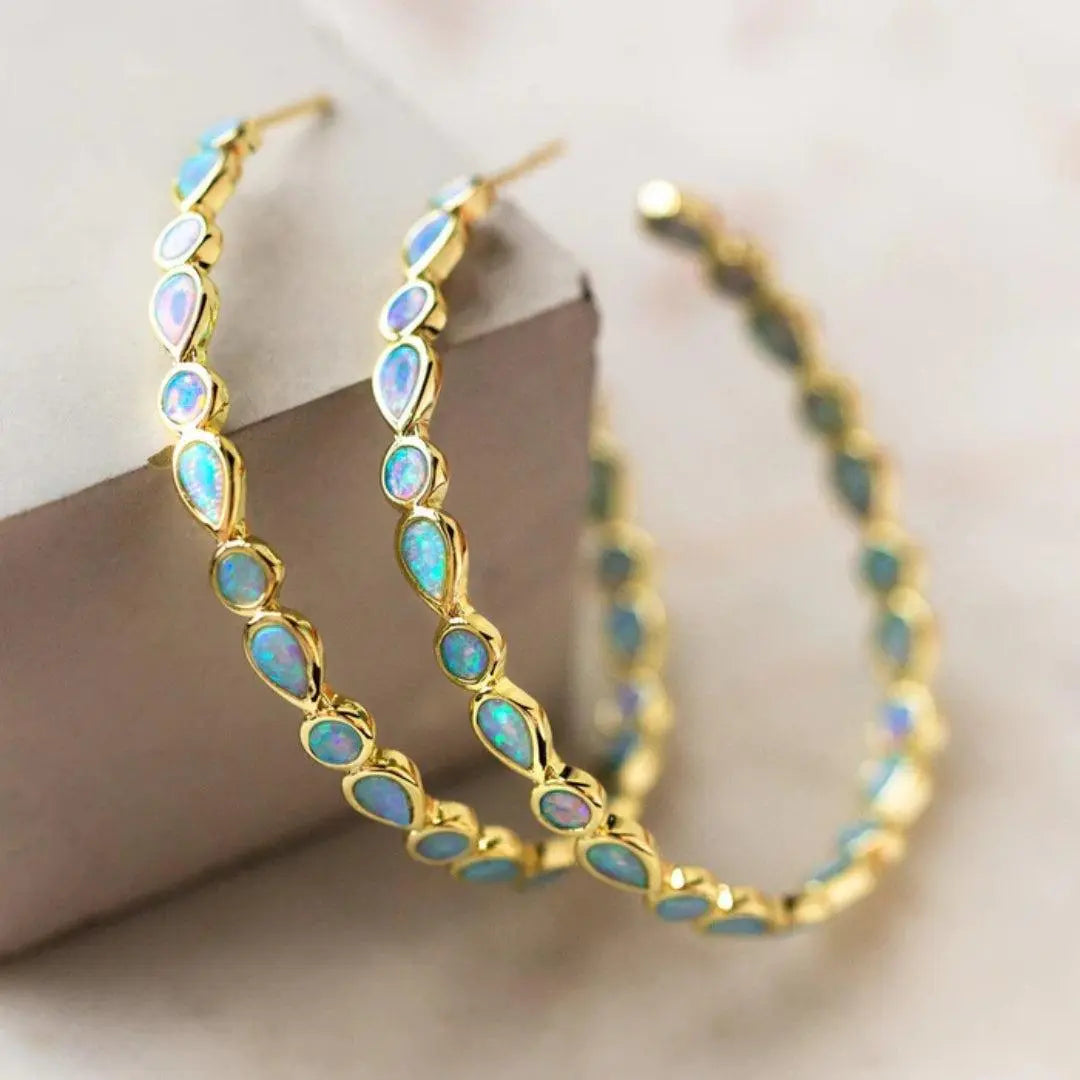 Boucles d'oreilles en or avec opale bleue vintage