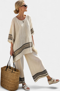 Mariella – Elegant black striped linen top and flowing trousers