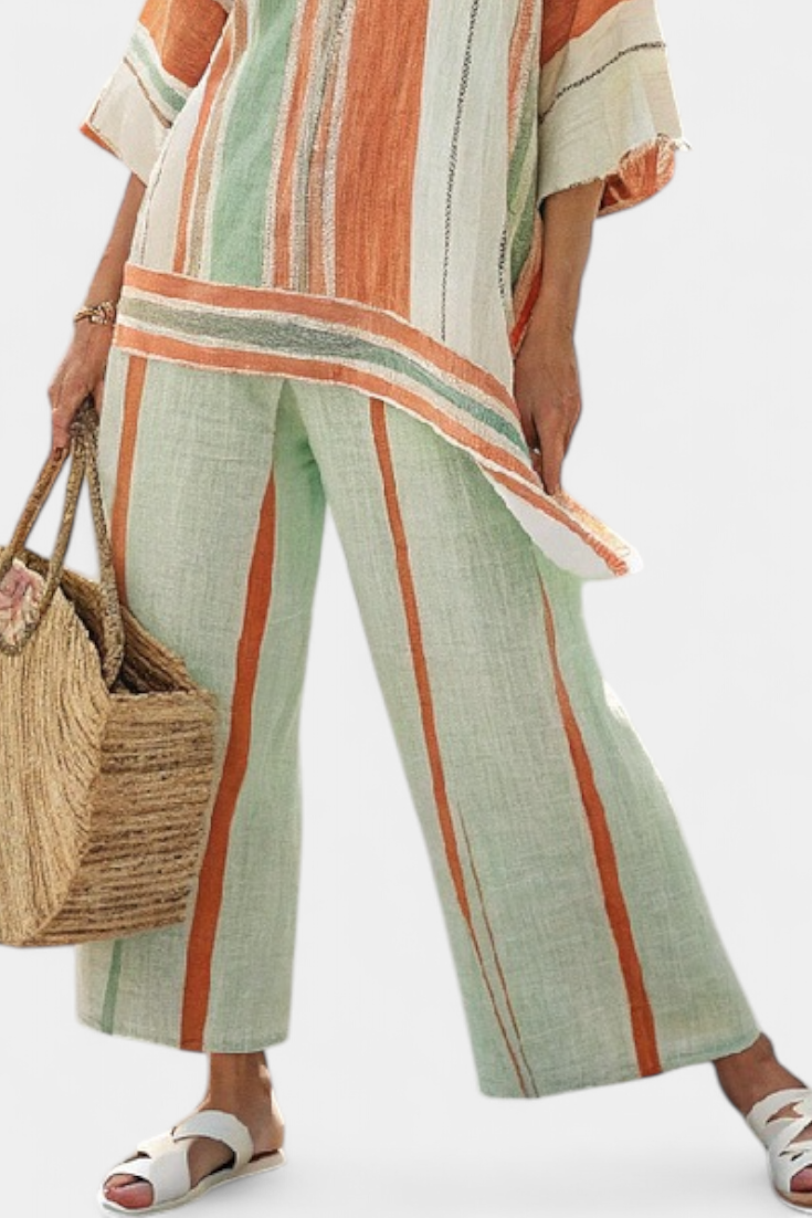 Elisabetta – elegant asymmetric top and wide-leg trousers