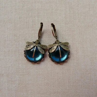 Boucles d'oreilles sphériques en forme de libellule en or antique