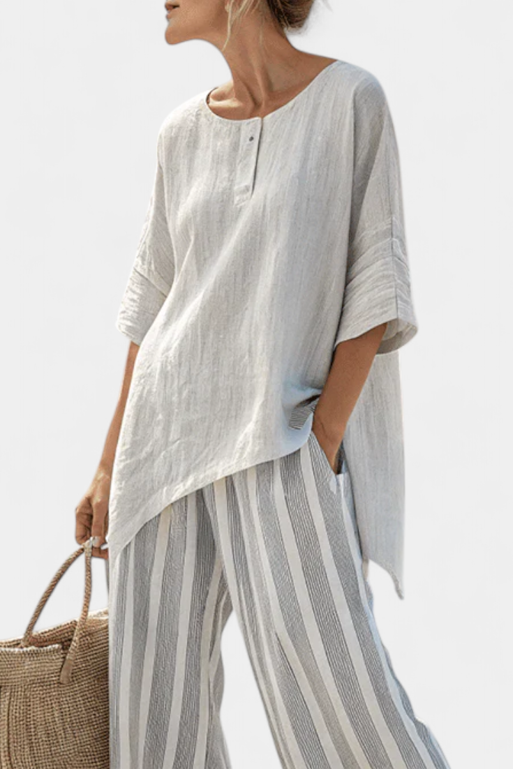 Fiorella – elegant asymmetric blouse and striped trousers