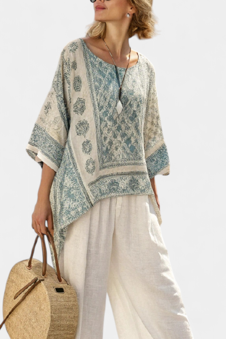 Annalisa – comfortable printed blouse and white wide-leg trousers