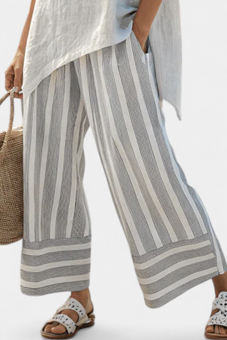 Fiorella – elegant asymmetric blouse and striped trousers