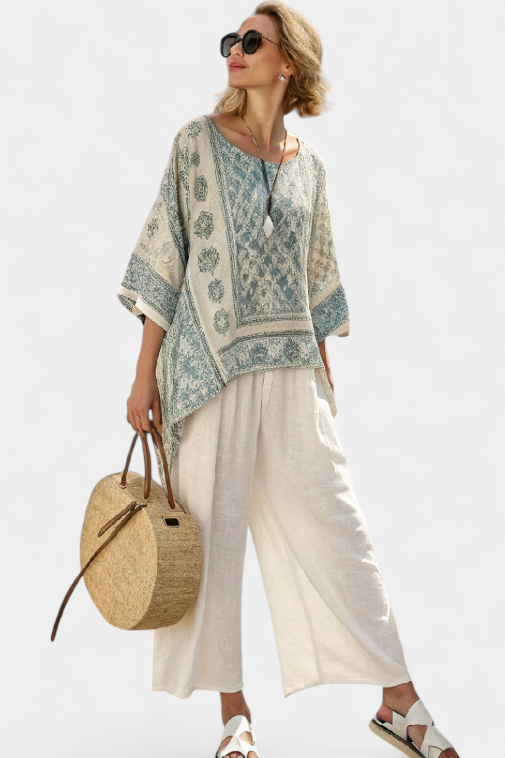 Annalisa – comfortable printed blouse and white wide-leg trousers